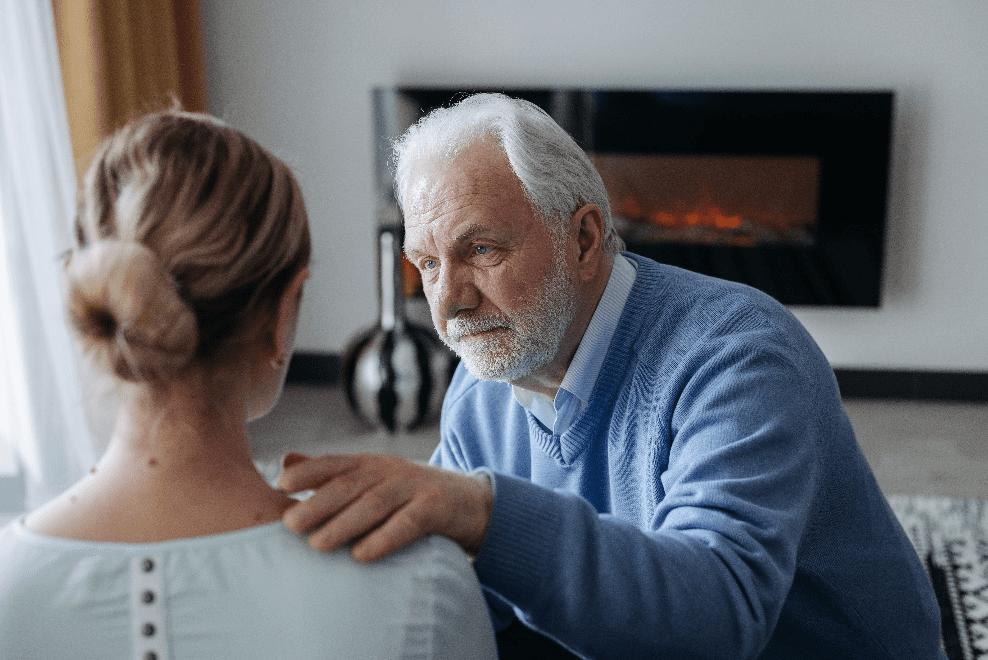 man consoling a woman